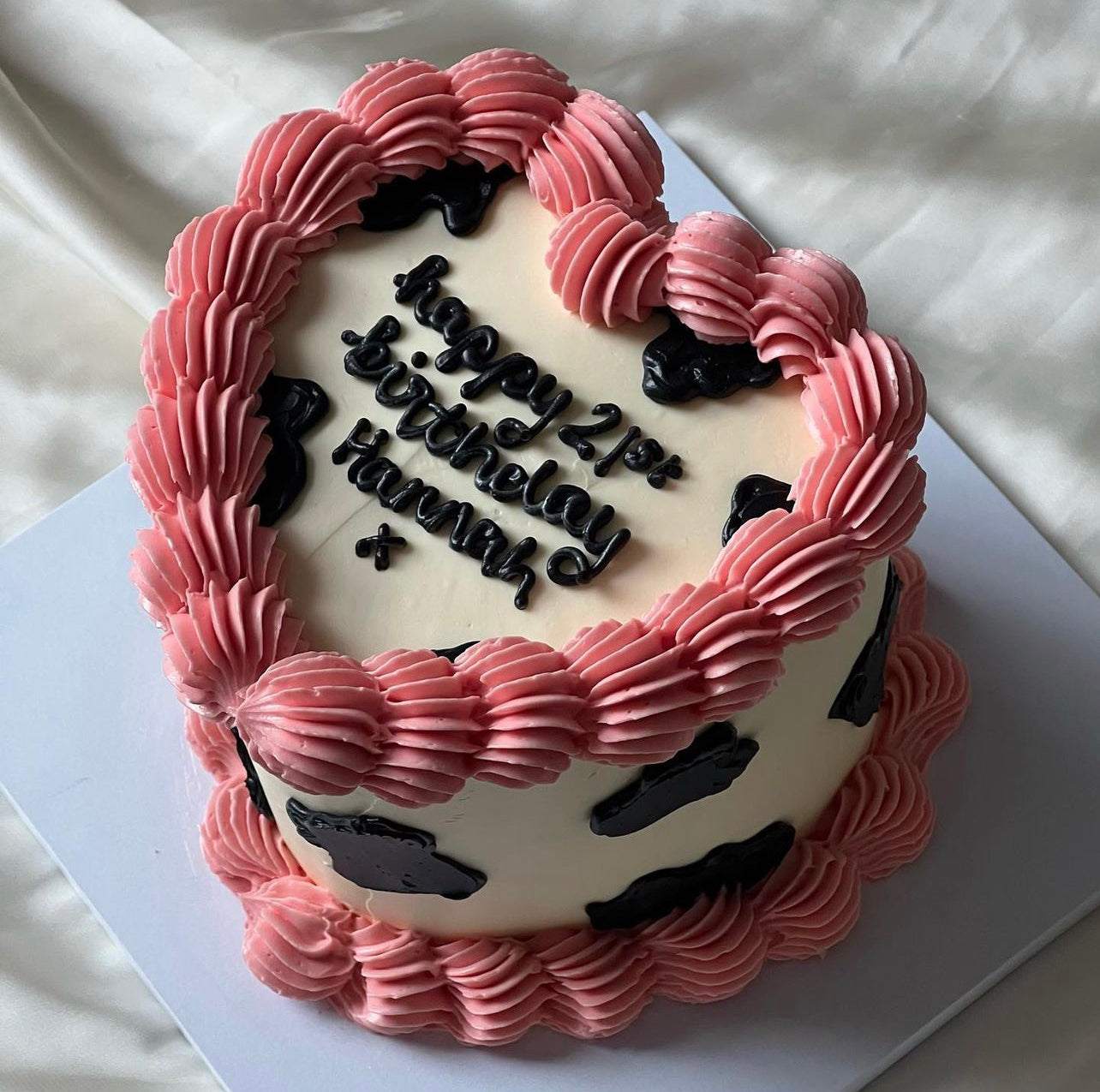 Cow print lunchbox cake